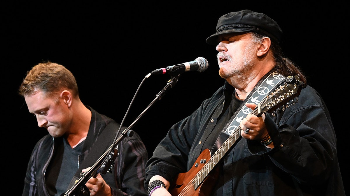 Cooper Carter and Matthew Sweet performing on stage