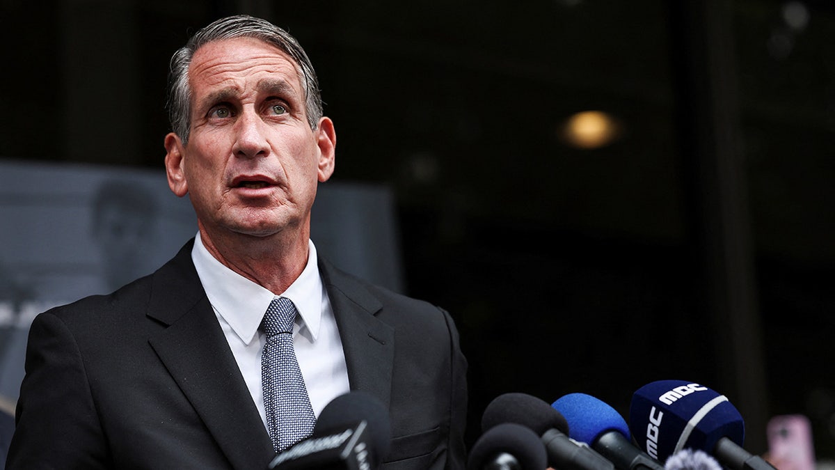 Lawyer Bryan Freedman speaks as family members of Erik and Lyle Menendez, the Beverly Hills brothers convicted of killing their parents, hold a press conference