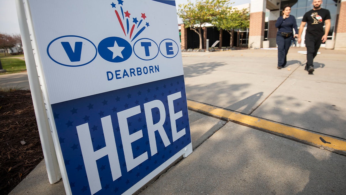 A man enters a polling station