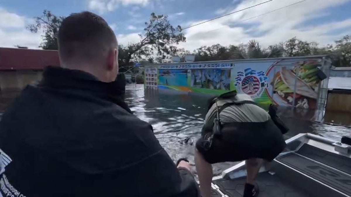 Hillsborough County Sheriff's Office officers on a boat