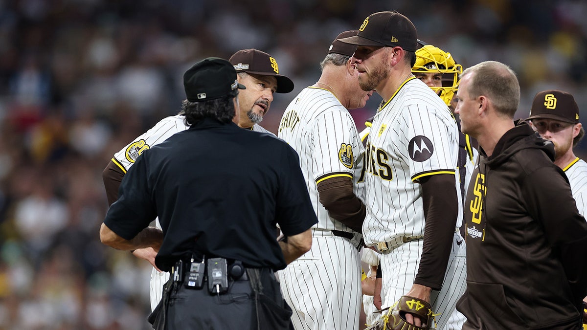 Musgrove with coach and referee