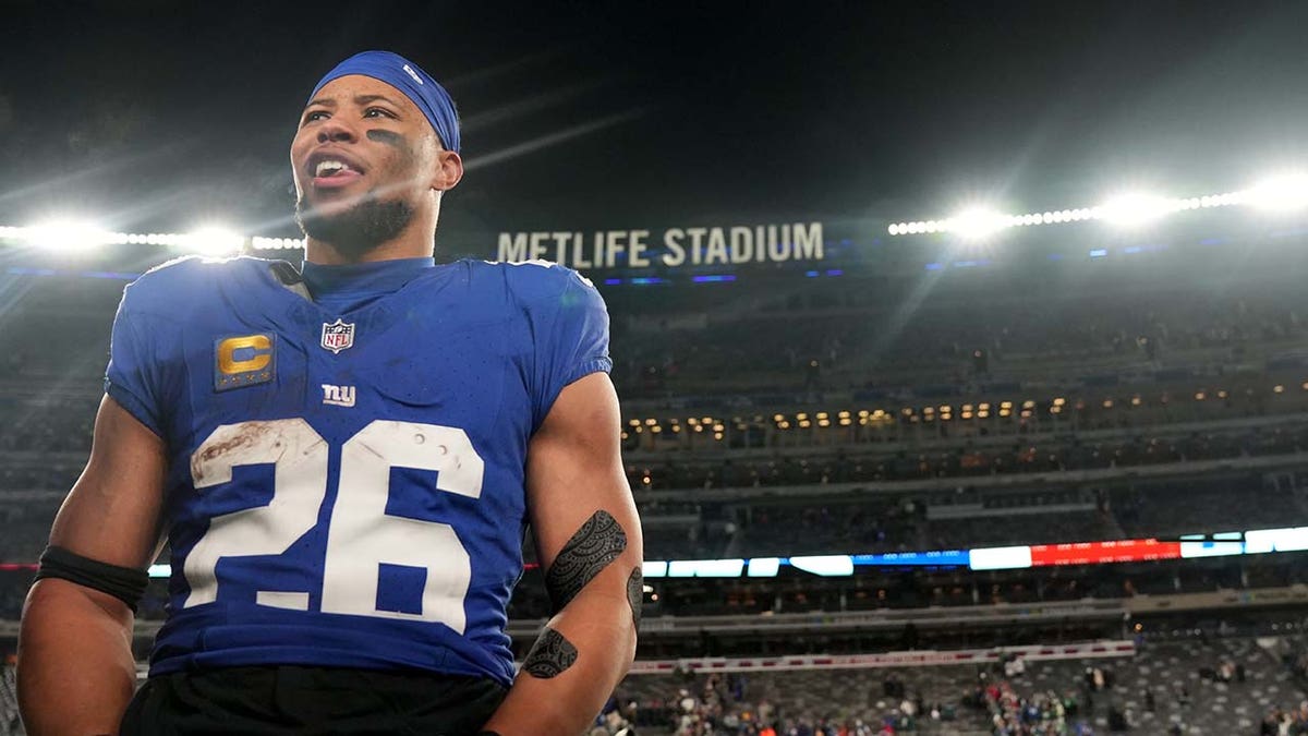 Saquon Barkley ma na sobie koszulkę Giants 