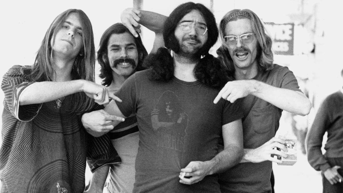 Phil Lesh posing with The Grateful Dead in San Francisco.