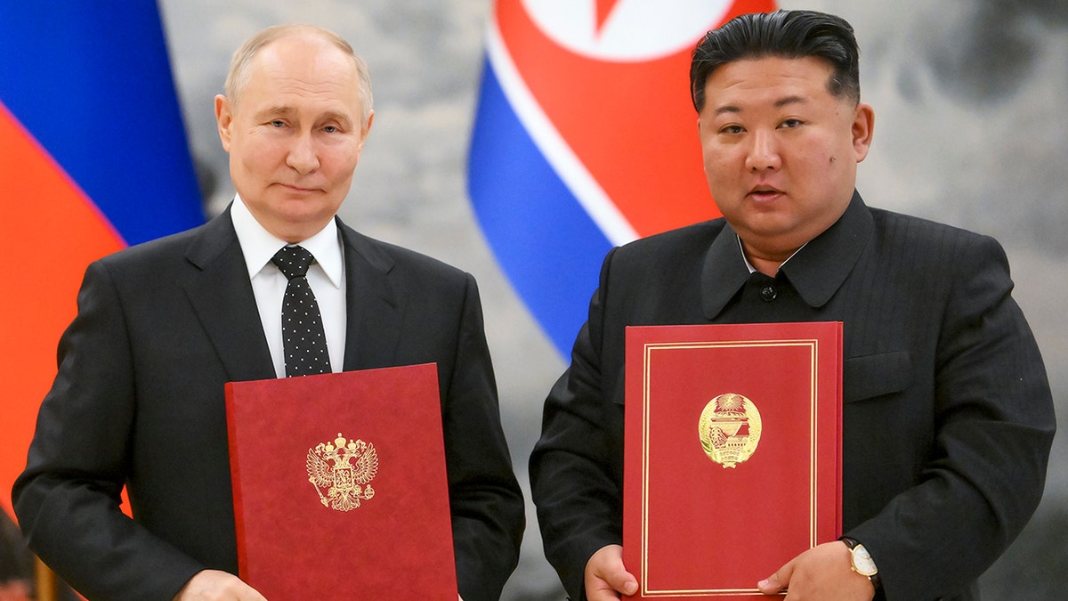 Vladimir Putin y Kim Jong Un