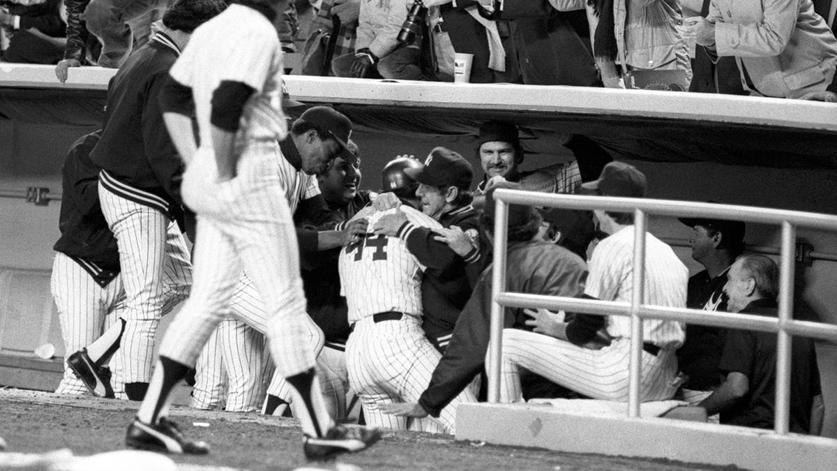 Reggie Jackson celebrates his home run