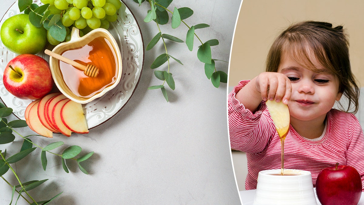 A Jewish girl adheres to the tradition of Rosh Hashanah and dips apples in honey.