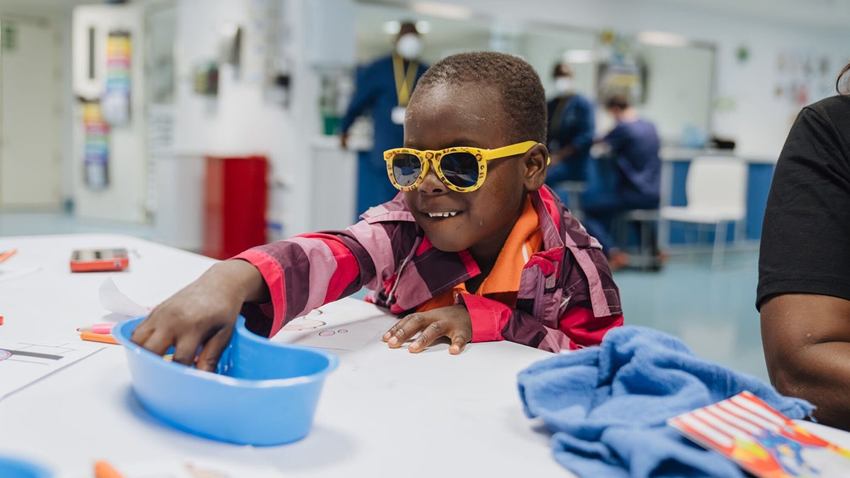 Mamadou receiving treatment