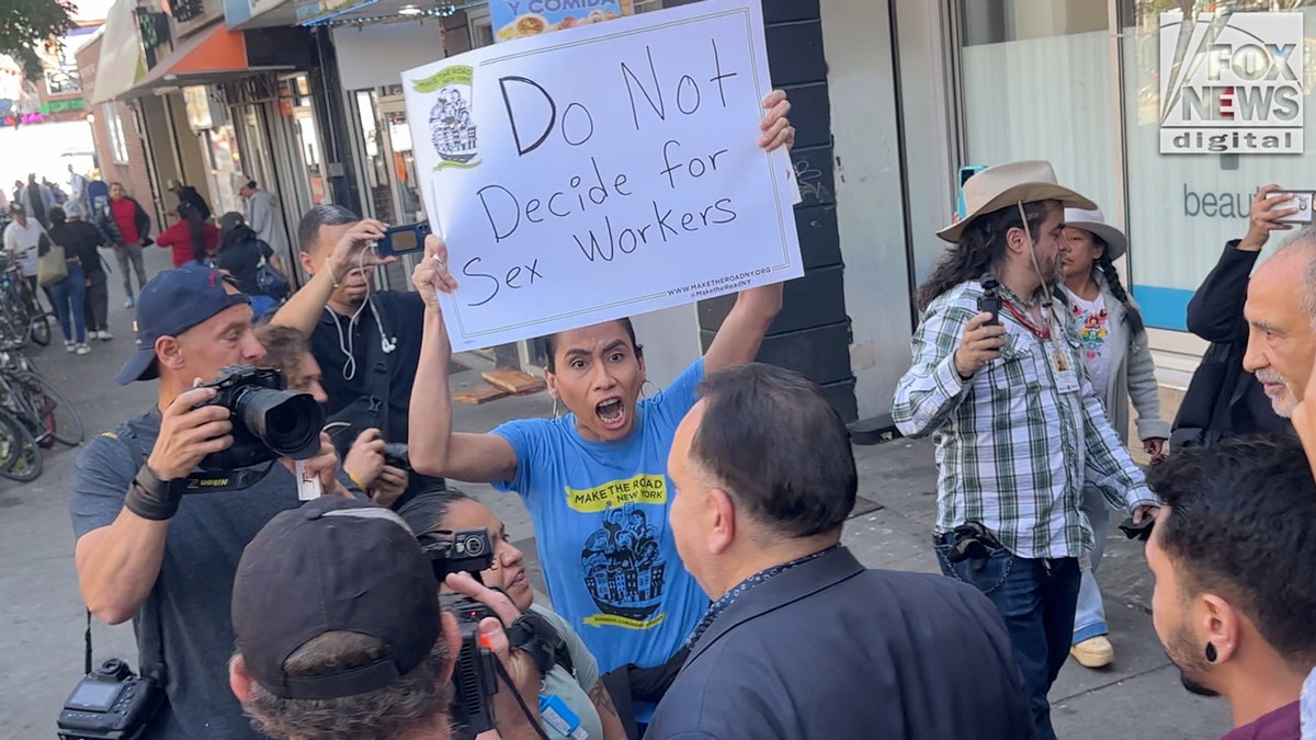 Protester heckles Hiram Monserrate pursuing  a rally successful  Queens