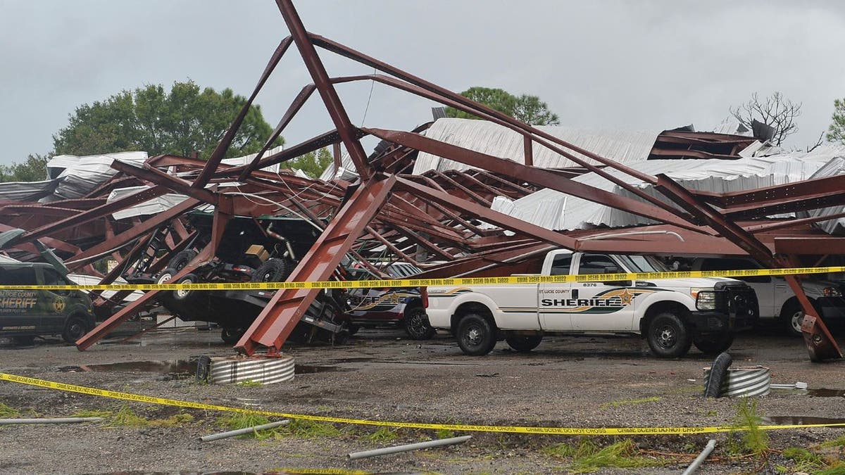 tornado harm  to St. Lucie County Sheriff's bureau   building