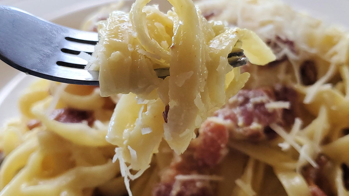A close up of tagliatelle carbonara.