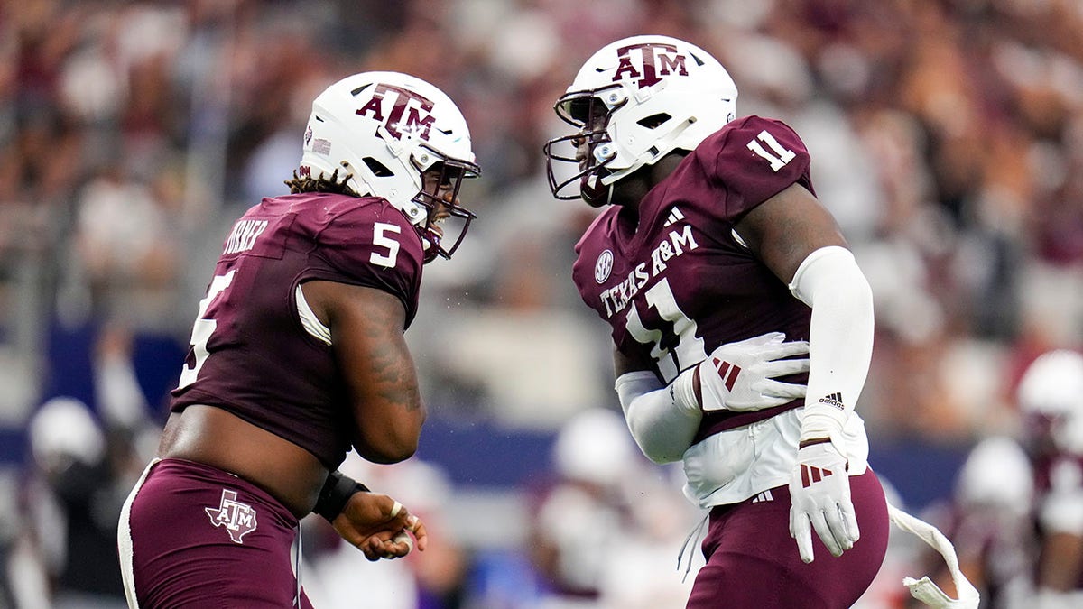 Texas A&M football players celebrate