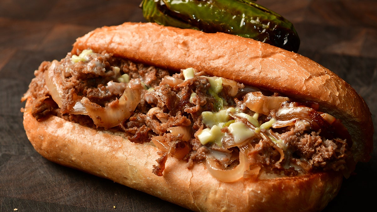 A cheesesteak sandwich with some cowboys-inspired additions. 