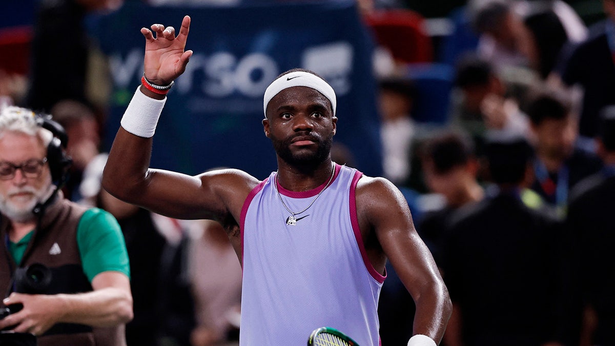 Frances Tiafoe celebra