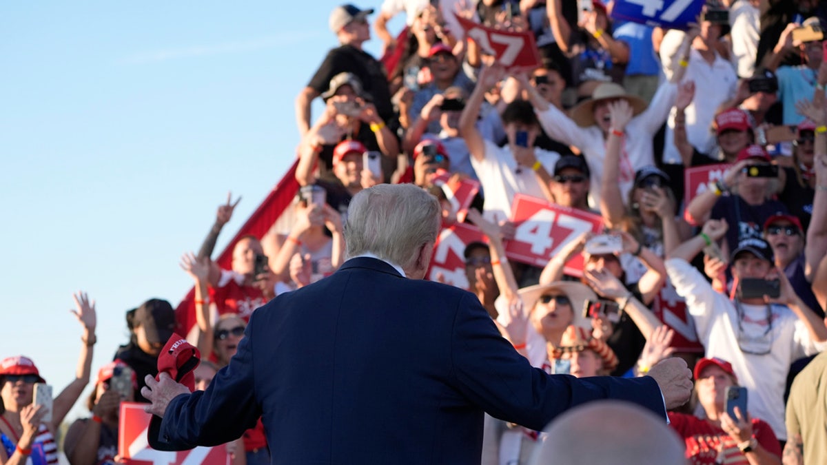 Republican presidential candidate, former President Donald Trump, arrives Saturday to speak at a campaign rally at the Calhoun Ranch in Coachella, California.