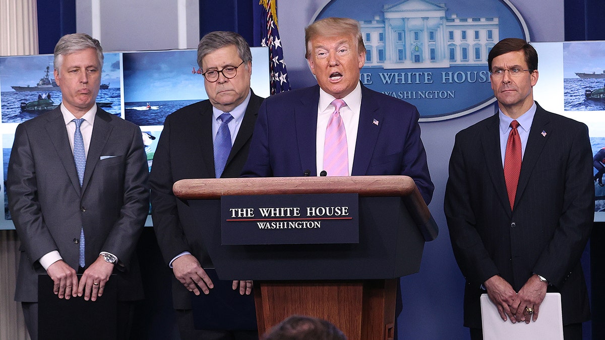 President Trump speaks astatine  gathering  of WH coronavirus task   unit  alongside National Security Adviser Robert O'Brien, Attorney General William Barr and Defense Secretary Mark Esper