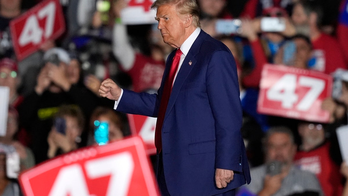 Former President Trump, the Republican presidential nominee, departs after speaking during a campaign rally at the Suburban Collection Showplace Saturday in Novi, Mich.?