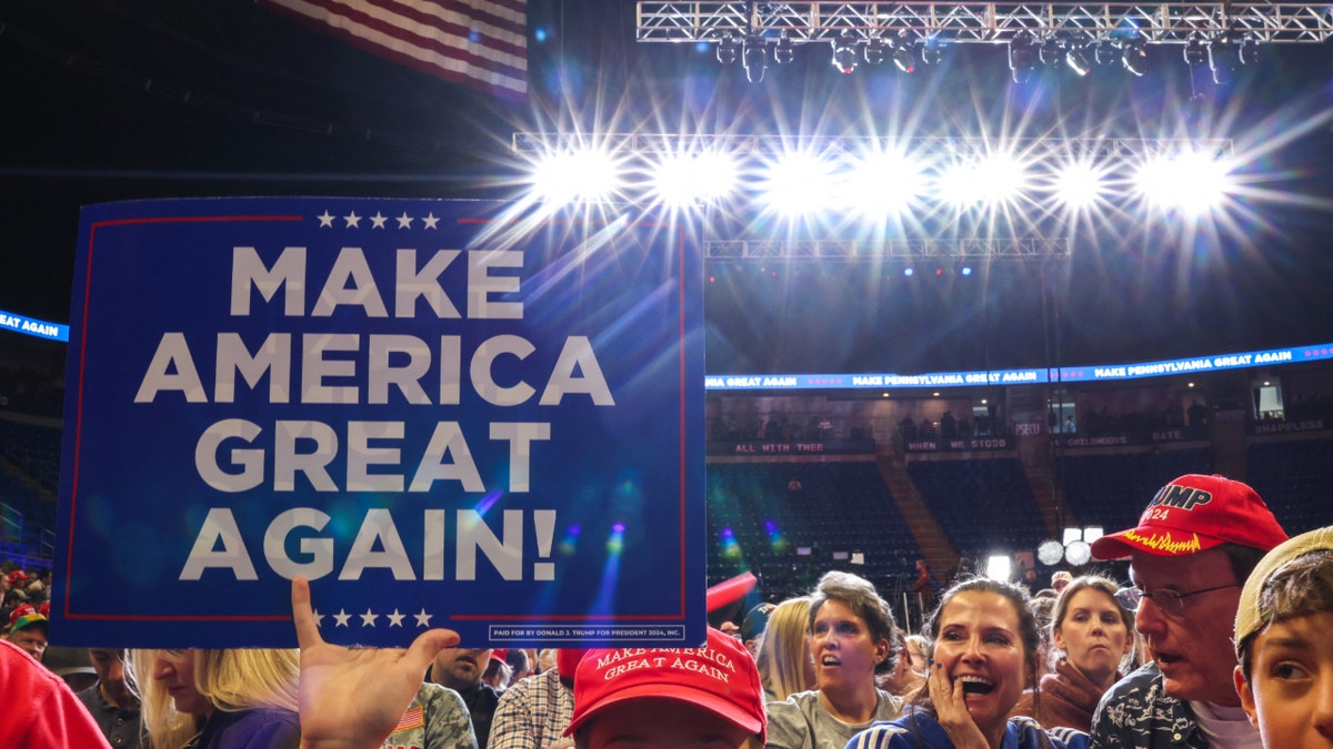 Supporters of erstwhile  President Donald Trump be  a run  rally successful  State College, Pennsylvania. (Photo by Charly Triballeau/AFP via Getty Images)