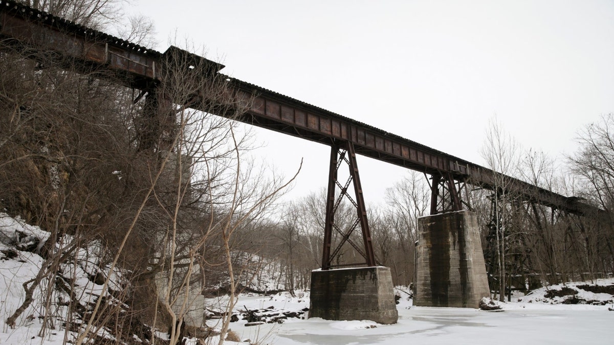 Snow covers the h2o  of Deer creek arsenic  the Monon High Bridge towers above, Wednesday, Feb. 9, 2022 successful  Delphi.