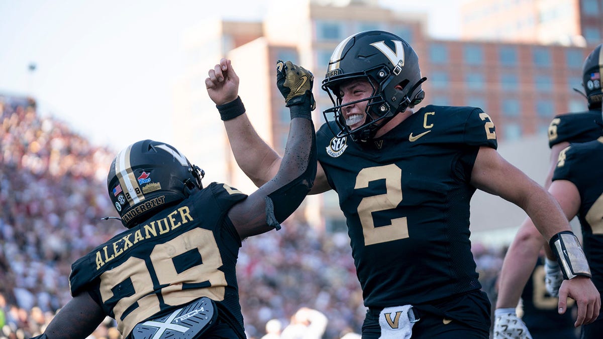 Vanderbilt football players celebrate a touchdown