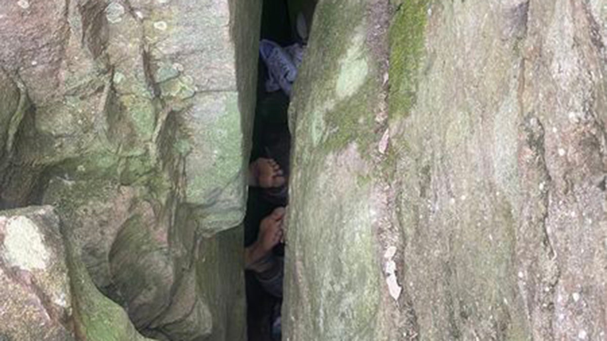 Woman stuck successful  betwixt  boulders successful  Australia