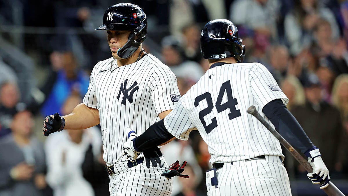 The Yankees celebrate the run scored