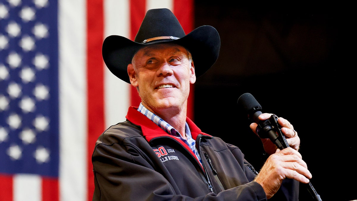 Rep. Ryan Zinke (R-MT) and his wife Lolita Zinke take the stage to speak during a rally for Republican presidential candidate, former President Donald Trump, at Montana State University's Brick Breeden Fieldhouse on August 9, 2024, Bozeman, Montana.