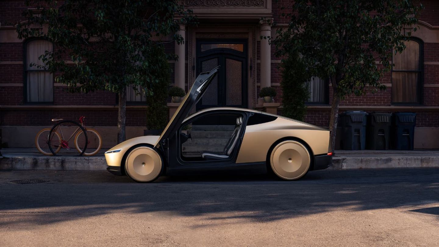 3 elon musk unveils teslas robovan robotaxis and humanoid robots