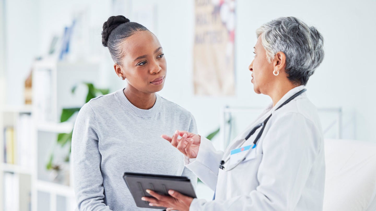 b310405c woman at doctor