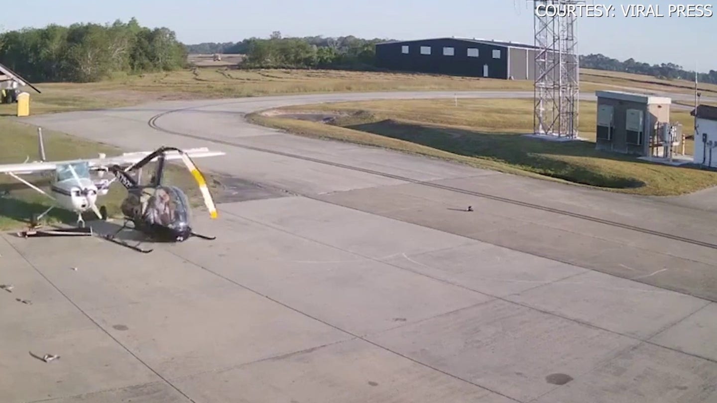 helicopter spins out of control at texas airport hits parked plane 1