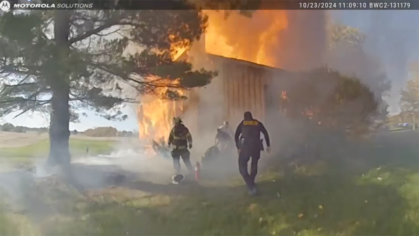 Heroic Rescue Caught on Camera as Woman Pulled from Burning Ohio Home