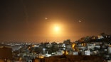 Many rockets, fired from Iran, are seen over Jerusalem from Hebron, West Bank on October 01, 2024. The Israeli army announced that missiles were fired from Iran towards Israel and sirens were heard across the country, especially in Tel Aviv.