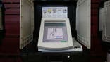 A Diebold Election Systems Inc. electronic voting machine sits in a privacy booth at a polling location during the Georgia primary runoff elections in Atlanta, Georgia, U.S., on Tuesday, July 24, 2018. As government officials warn of continuing cyberattacks intended to disrupt U.S. elections, Georgia is among 14 states heading into Election Day using touchscreen, computerized machines that don't meet federal security guidelines because they produce no paper recordso voters can't verify their choices and officials can't audit the results. Photographer: Elijah Nouvelage/Bloomberg via Getty Images