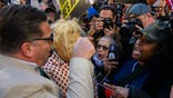 NEW YORK, NEW YORK - OCTOBER 27: Supporters of Republican presidential nominee, former U.S. President Donald Trump argue with Anti-Trump demonstrators outside during a campaign rally at Madison Square Garden on October 27, 2024 in New York City. Trumps appearance in the traditionally Democratic city comes less than two weeks before the presidential election. Vice President Kamala Harris and Trump are evenly tied in most national polls. (Photo by Alexi Rosenfeld/Getty Images)
