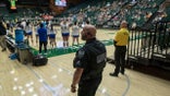 Colorado State University police behind the San Jose State University Spartans bench monitor Moby Arena during an NCAA Mountain West women’s volleyball game between the Spartans and the Colorado State Rams in Fort Collins, Colo., on Thursday, Oct. 03, 2024.