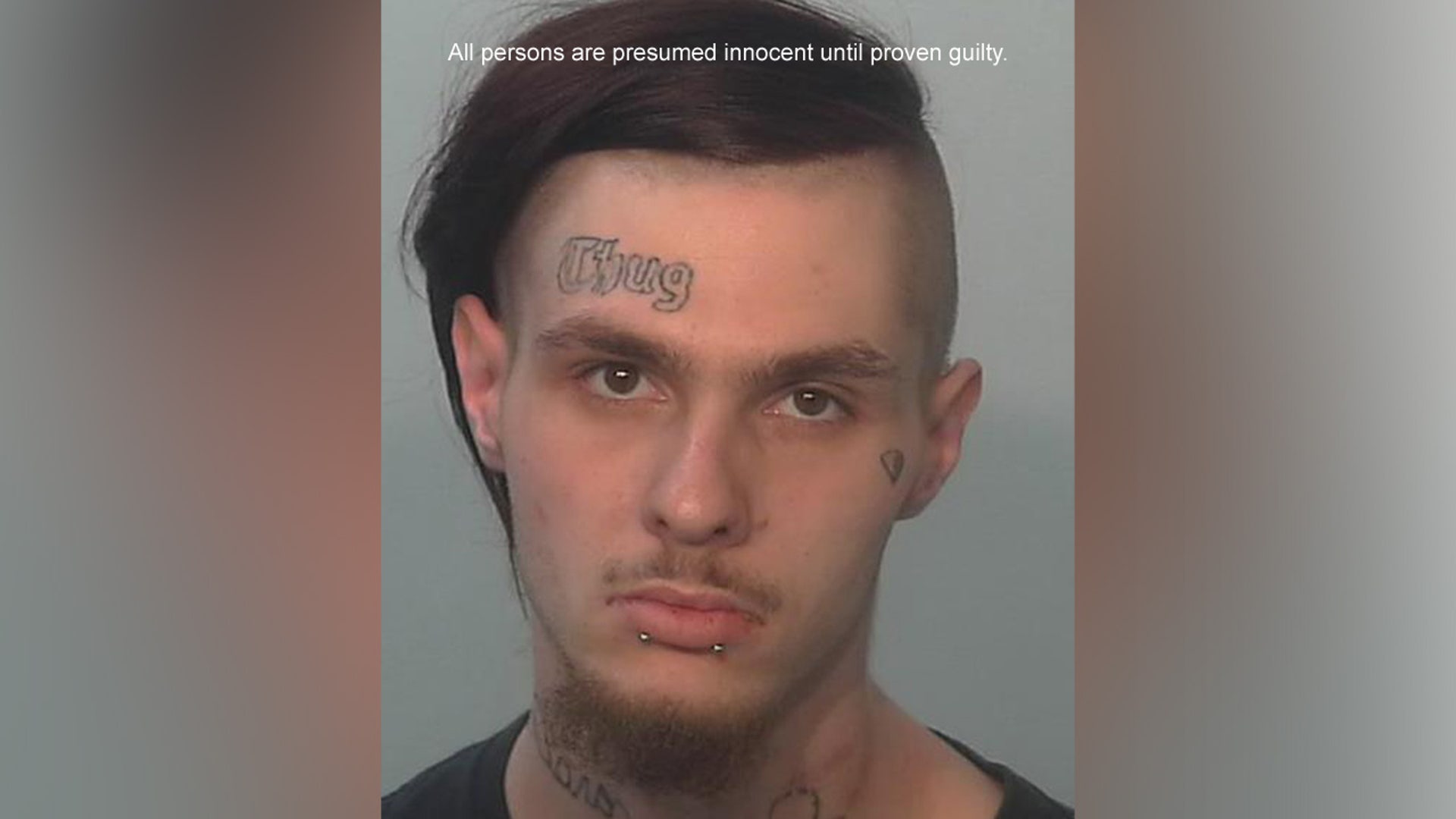 A mugshot of Aaron Moore