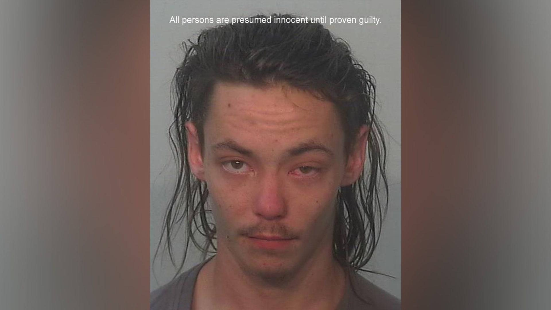 A mugshot of Corey Alpin