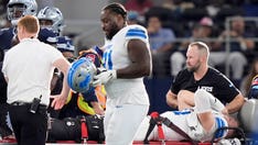 Lions' Aidan Hutchinson suffers gruesome injury vs Cowboys, leaves game on backboard