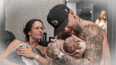 Country singer Brantley Gilbert abruptly pauses concert as wife gives birth on tour bus