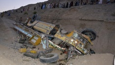 Bus filled with wedding guests plunges into a ravine, killing 7