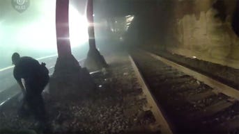 Heart-stopping video shows Seattle police rescue man from tracks moments before train roars past - Fox News