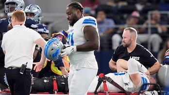 Lions' Aidan Hutchinson suffers gruesome injury vs Cowboys, leaves game on backboard