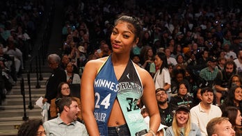 Angel Reese sits courtside at WNBA Finals with split Lynx/Liberty outfit