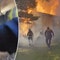 Ohio woman pulled to safety from basement while home above her engulfed in flames, bodycam shows