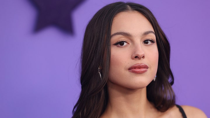 Olivia Rodrigo falls through trapdoor during performance