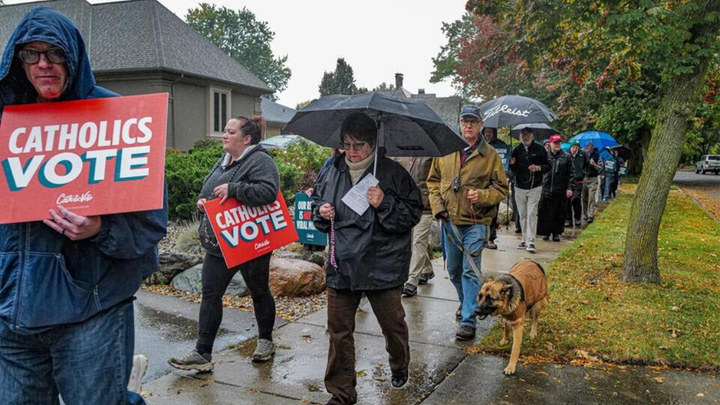 Christian crowd harassing Governor Whitmer after she made fun of a weird cannibalistic Catholic ritual 🚨