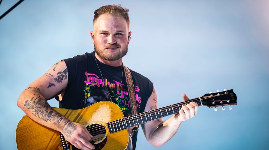 Country star Zach Bryan’s anti-ICE lyrics add to growing list of public controversies