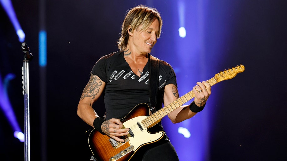 Keith Urban performing astatine  CMA Fest 