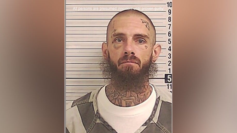 A mugshot of Travis Smith