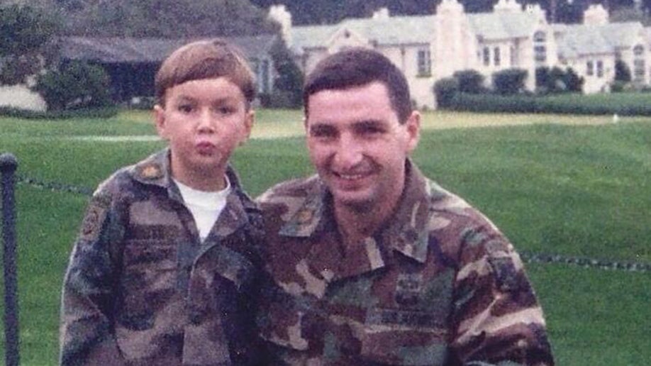 Quets young with his dad