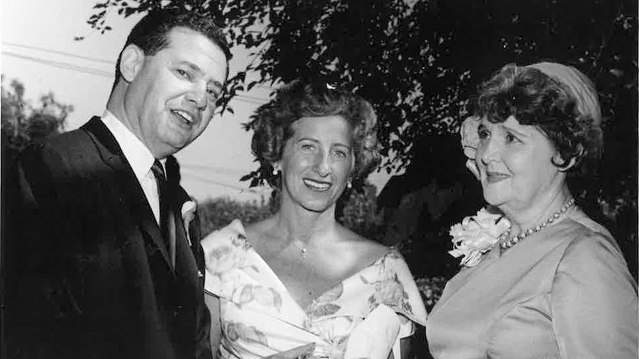 Warren Cowan with two of his wedding guests.